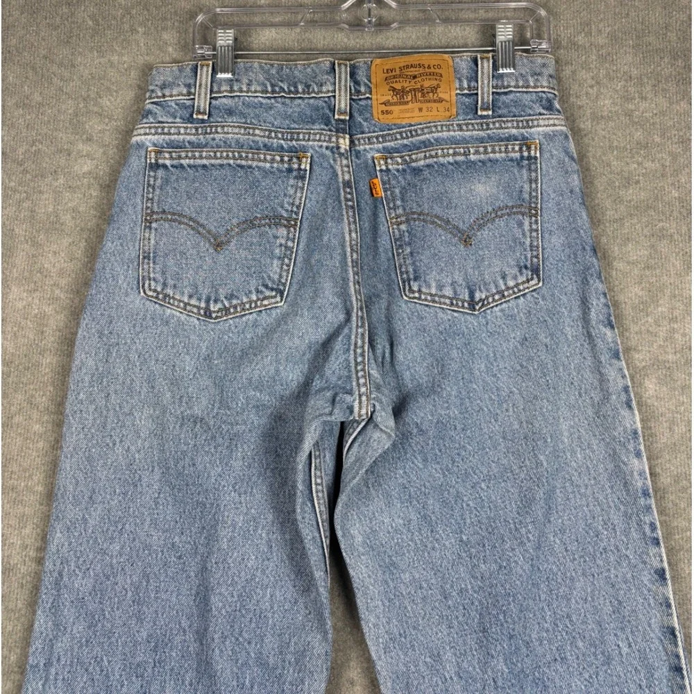 VTG‎ Levi's 550 Relaxed Fit Tapered Leg Orange Tab Jeans 32x33 Light Wash Blue